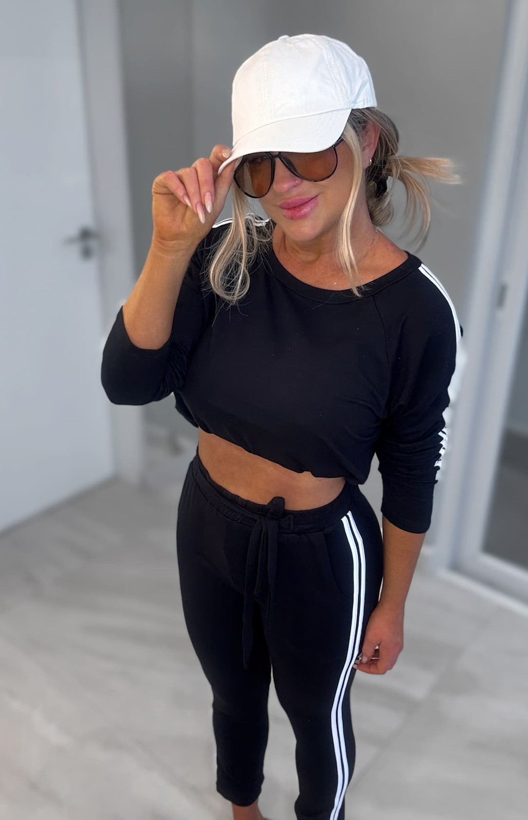 Conjunto moletinho blusa e calça com listras preto