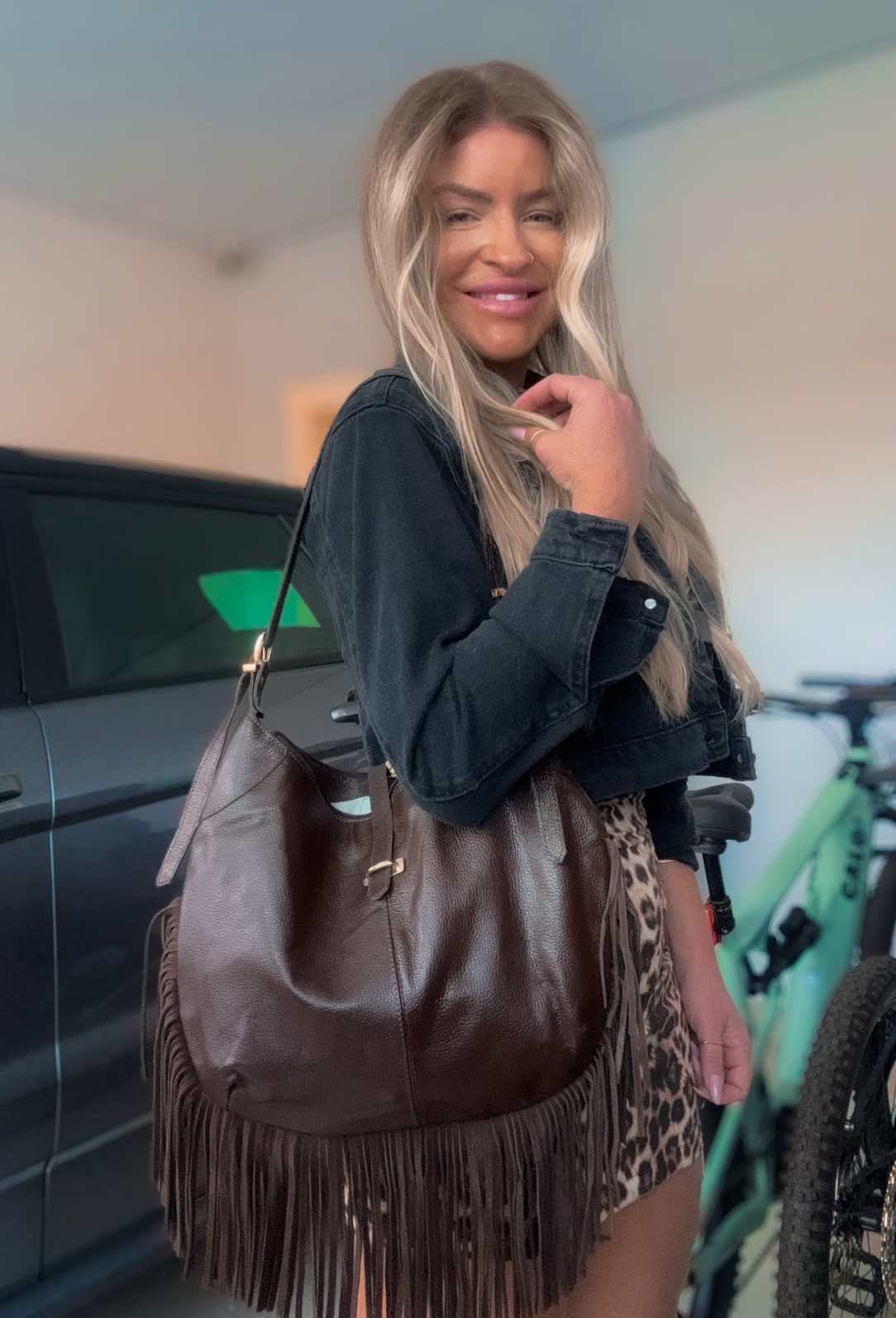 Bolsa em couro com franjas Julieta Bolsa em couro com franjas Julieta