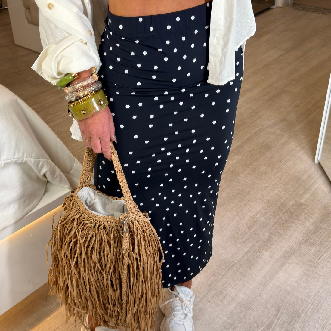 Saia midí estampa de Poá Saia midí estampa de Poá