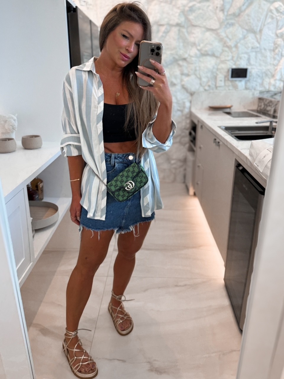 Camisa alongada estampa listras