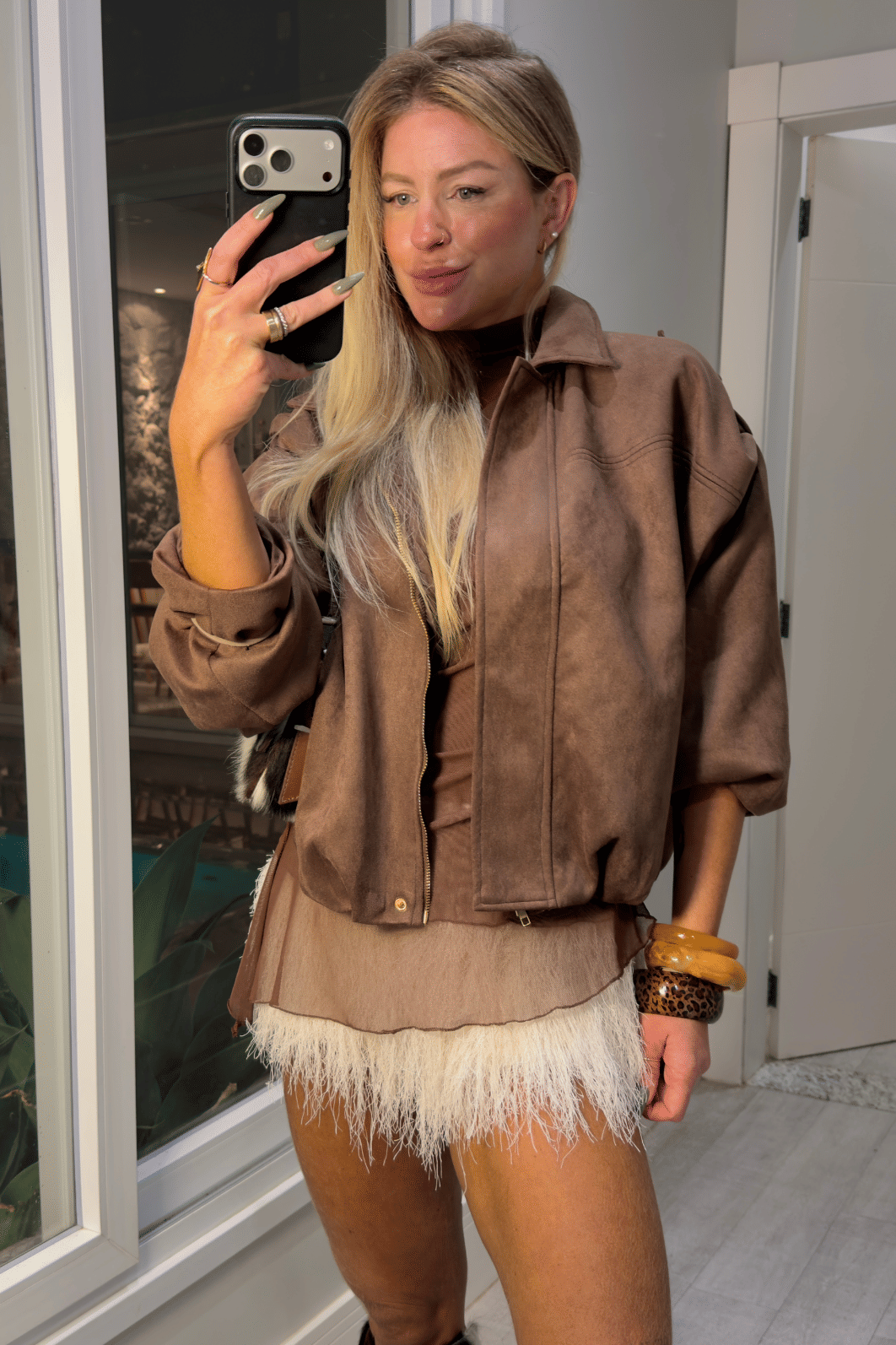 Short em plumas