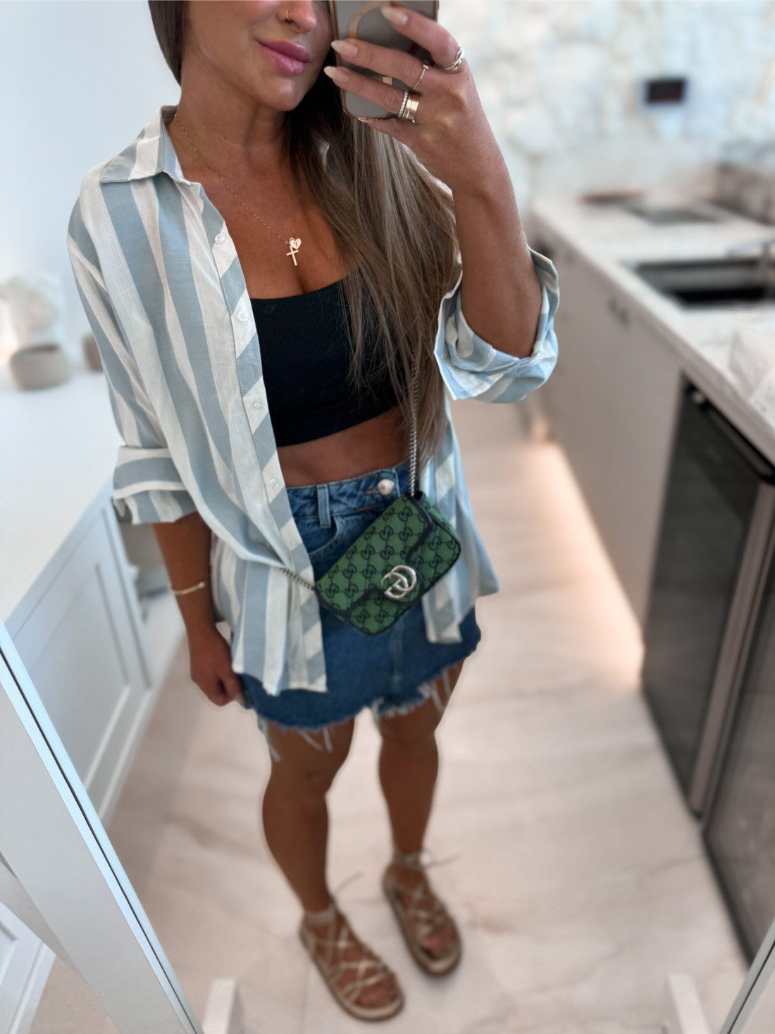 Camisa alongada estampa listras