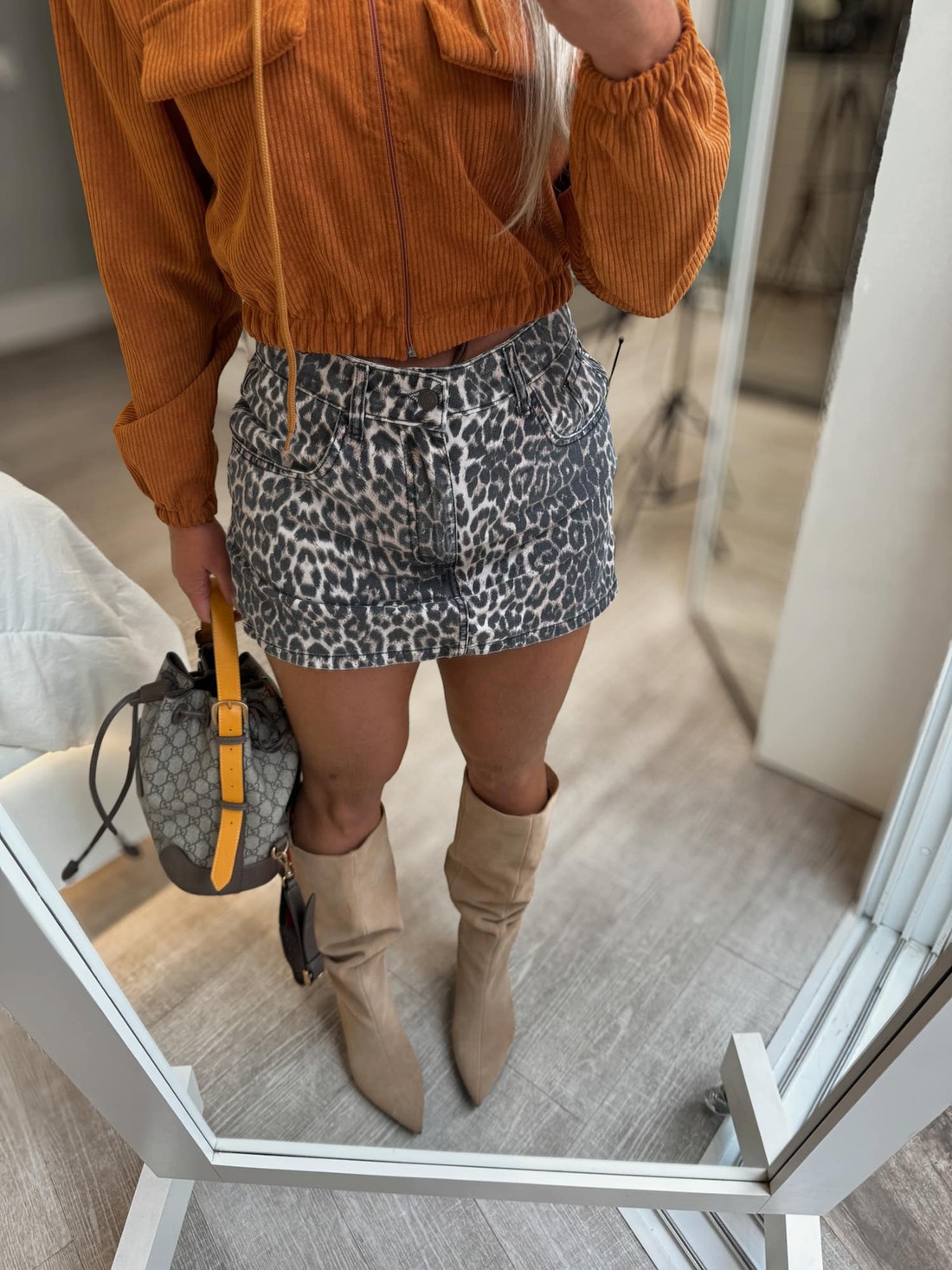 Short saia jeans estampa Onca