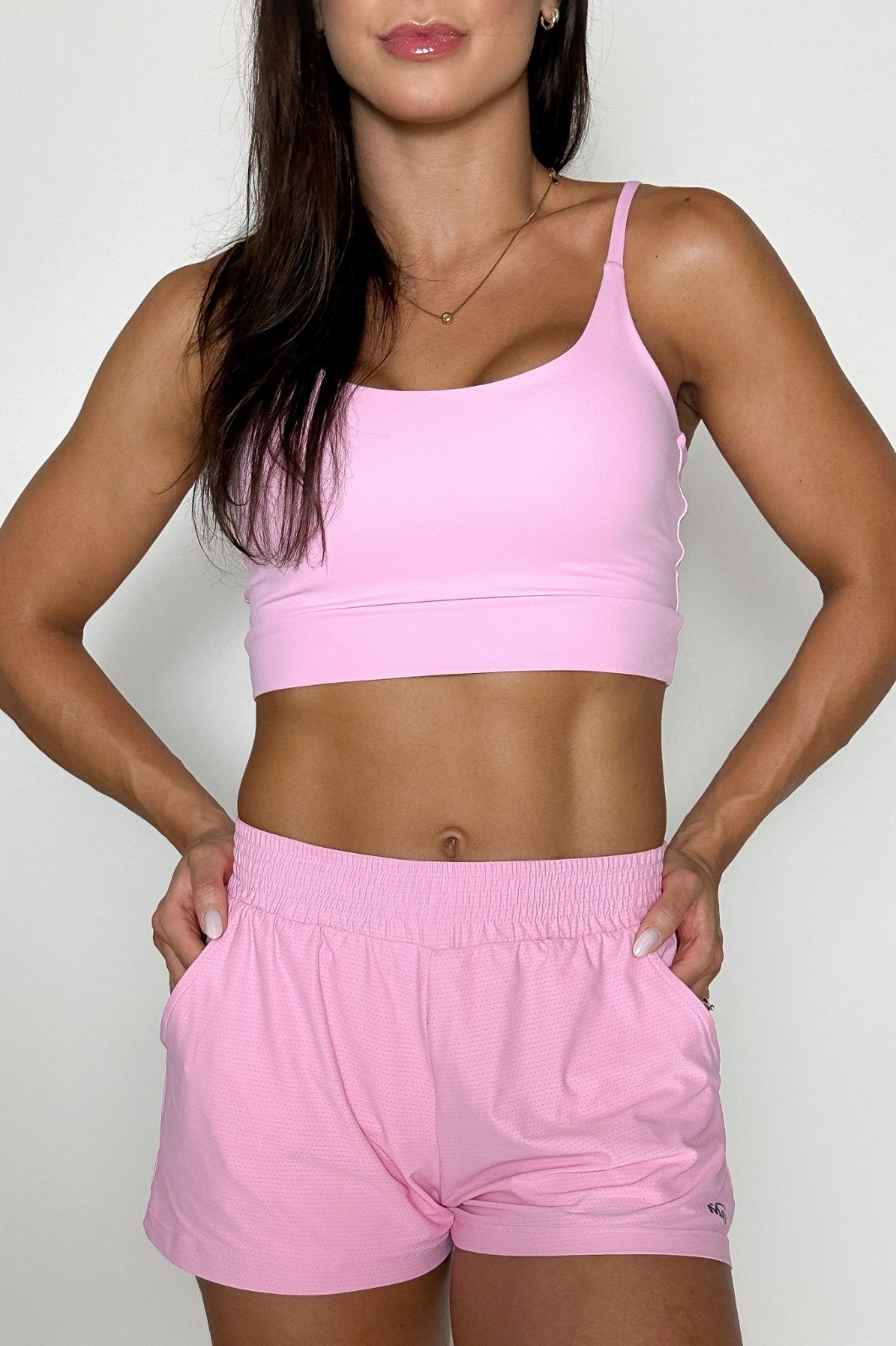 Conjunto Shorts Sobreposto Rosa Claro + Top Alcinha