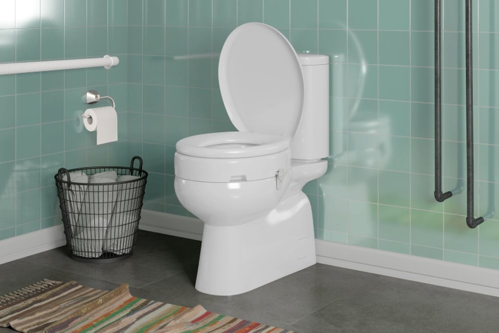 Assento Elevado 11cm Com Trava Especial Para Vaso Sanitário Astra Assento Elevado 11cm Com Trava Especial Para Vaso Sanitário Astra