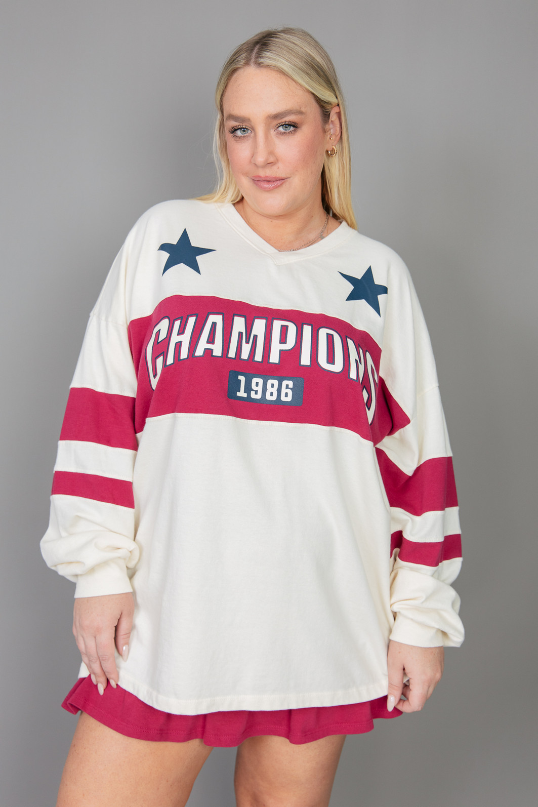 BLUSA MANGA LONGA DE MALHA OFF WHITE COM LISTRAS CHAMPIONS BLUSA MANGA LONGA DE MALHA OFF WHITE COM LISTRAS CHAMPIONS