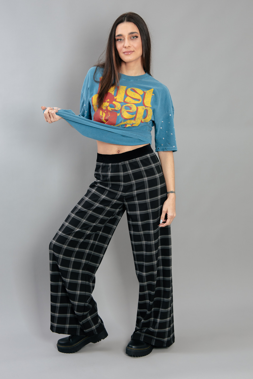 CALÇA ALFAIATARIA XADREZ COM ELÁSTICO NA CINTURA CALÇA ALFAIATARIA XADREZ COM ELÁSTICO NA CINTURA