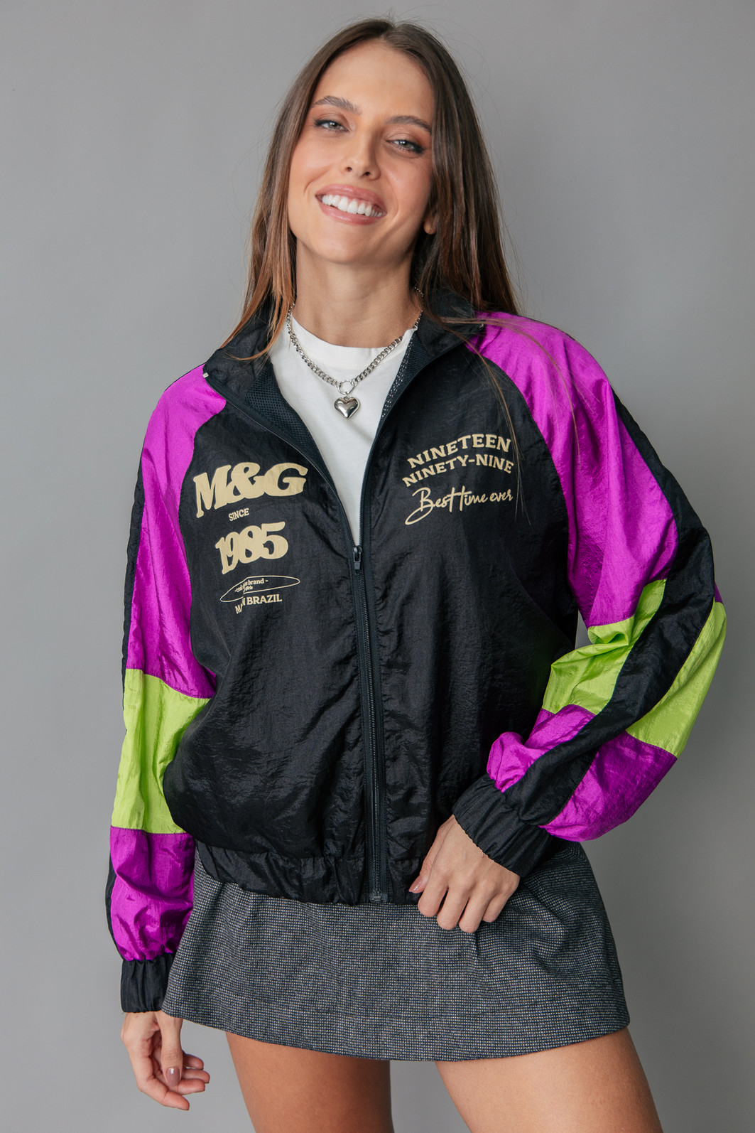 JAQUETA ESPORTIVA COM RECORTES COLORIDA NINETEEN