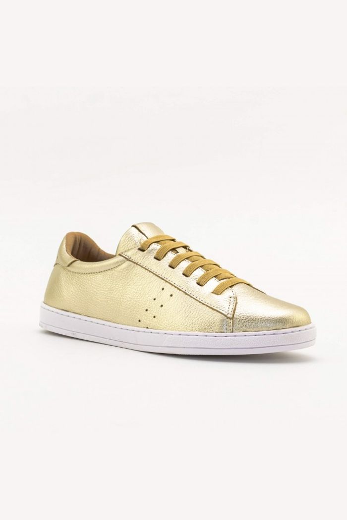 Tênis eXXXtouro em Couro Ouro