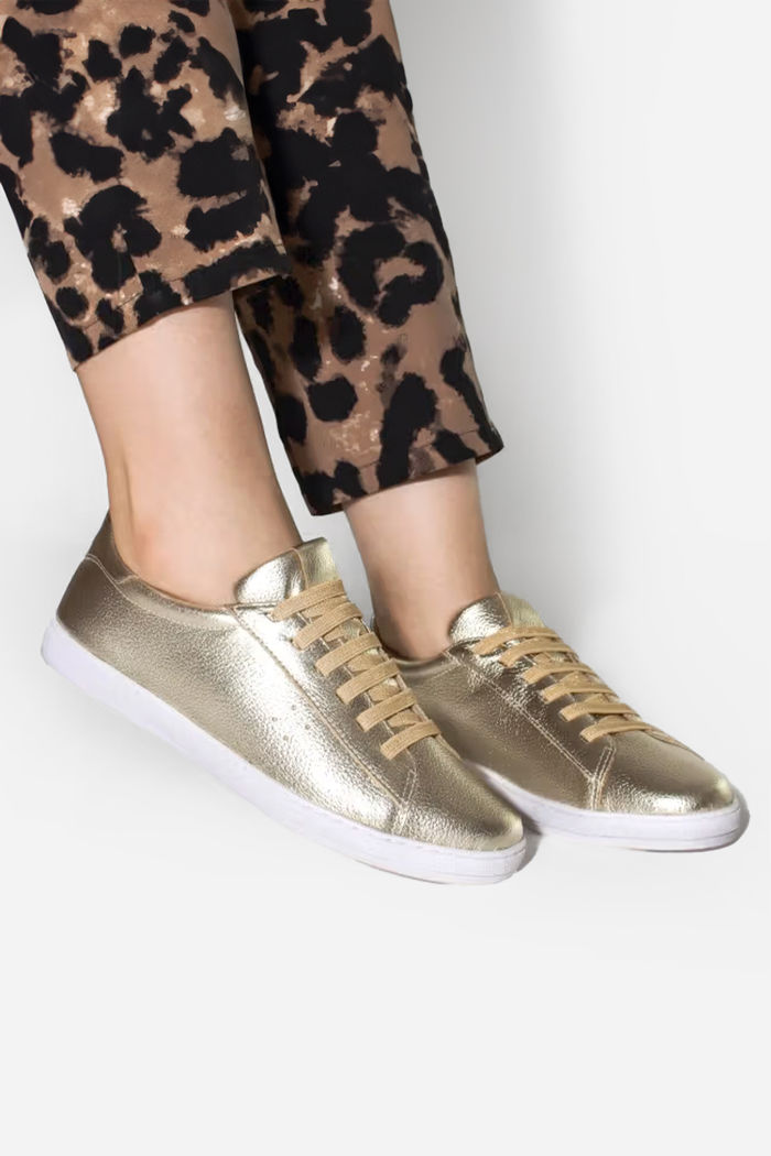 Tênis eXXXtouro em Couro Ouro