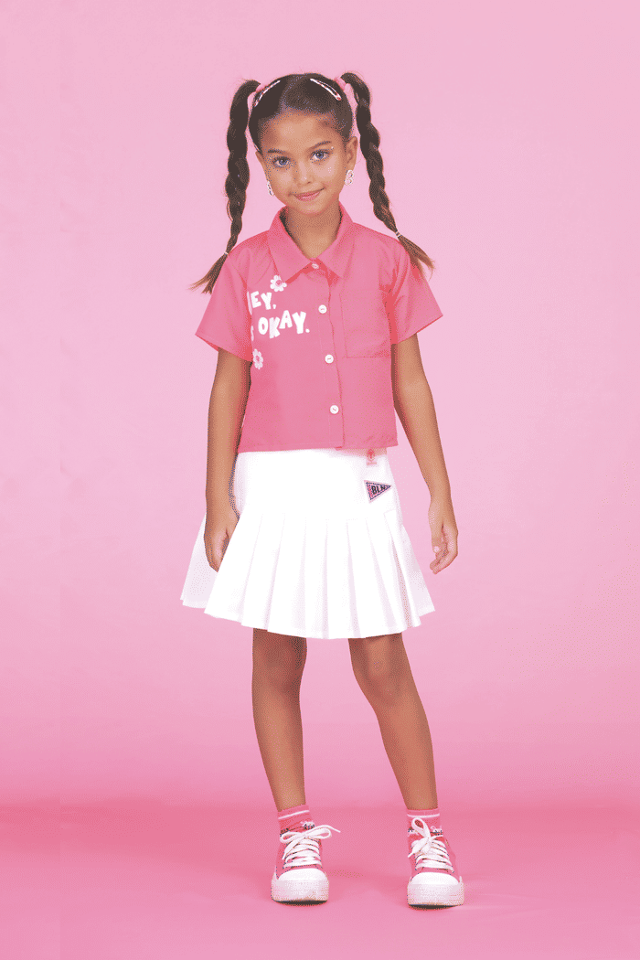 Saia de alfaiataria com pregas