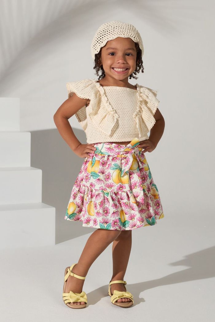 Conjunto blusa de tricô e saia estampada