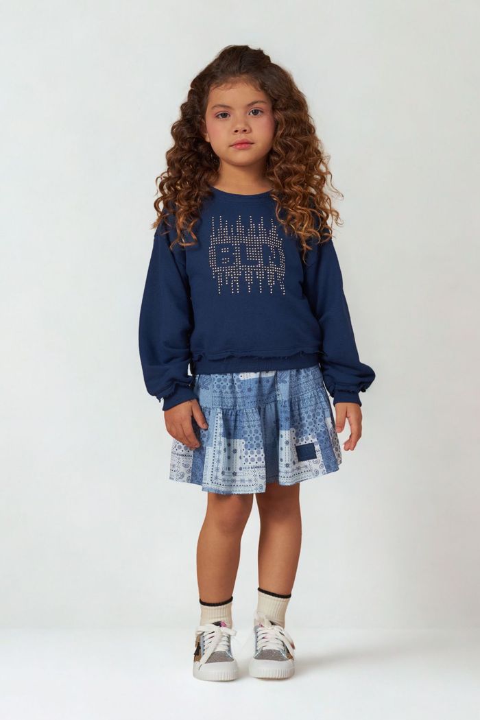 Conjunto moletom com pregas e saia estampada