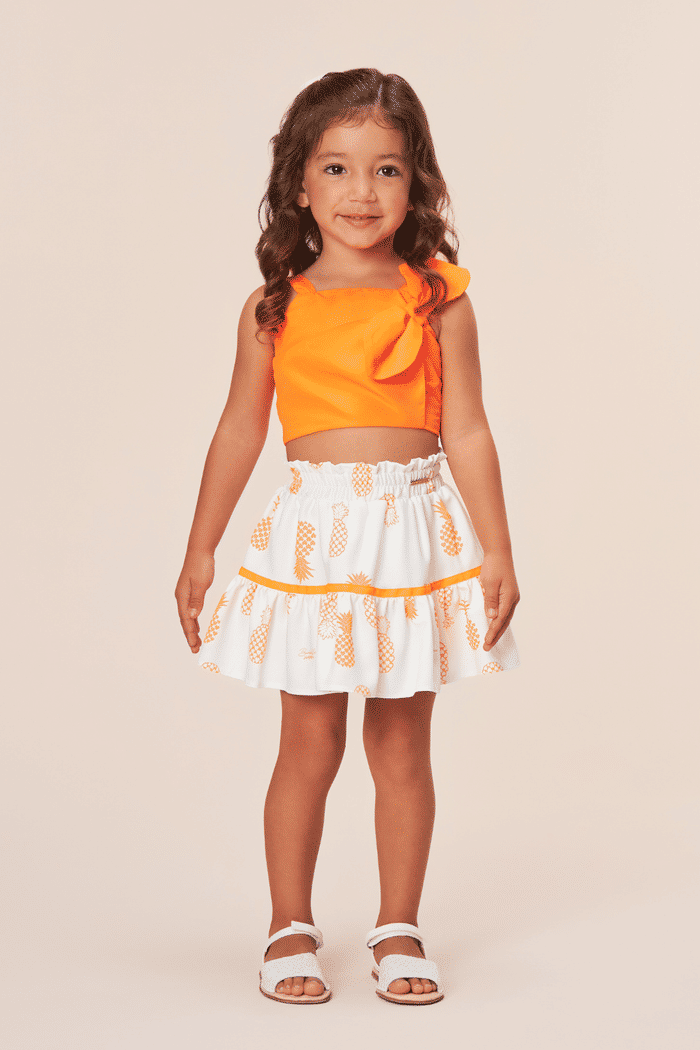 Conjunto top alça de laço e saia estampada