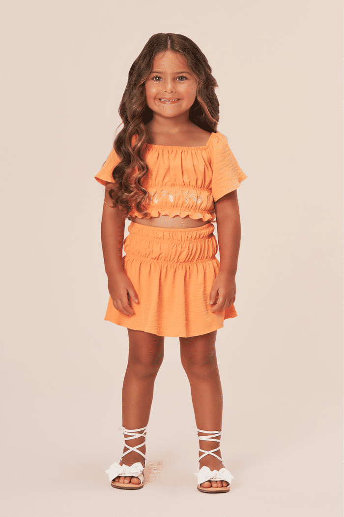 Conjunto blusa e saia de tecido dunas