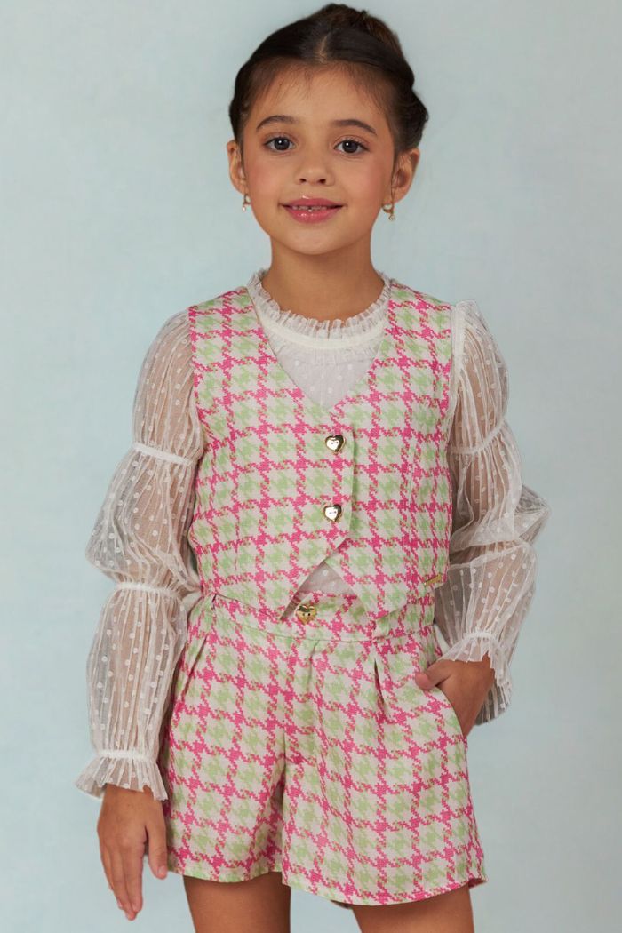 Blusa de tule poá com detalhes na manga bufante