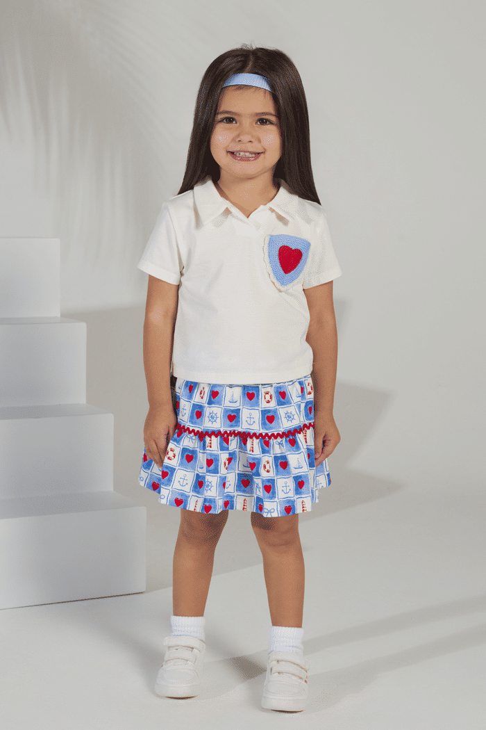 Conj. blusa off saia estampada