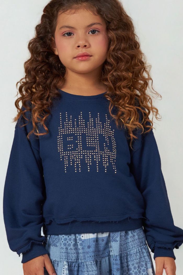 Conjunto moletom com pregas e saia estampada