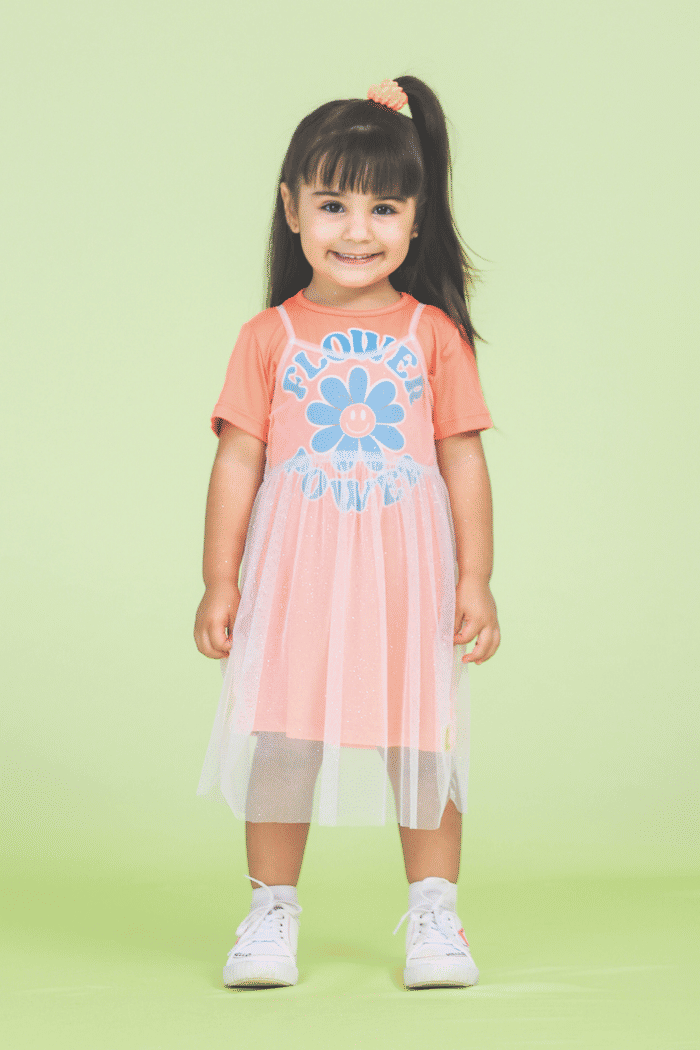 Conjunto vestido estampado de malha com sobreposição de tule glitter