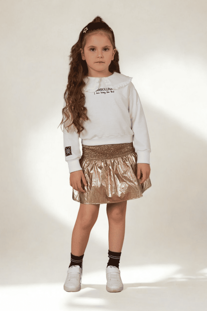 Conjunto blusa de moletinho com saia metalizada