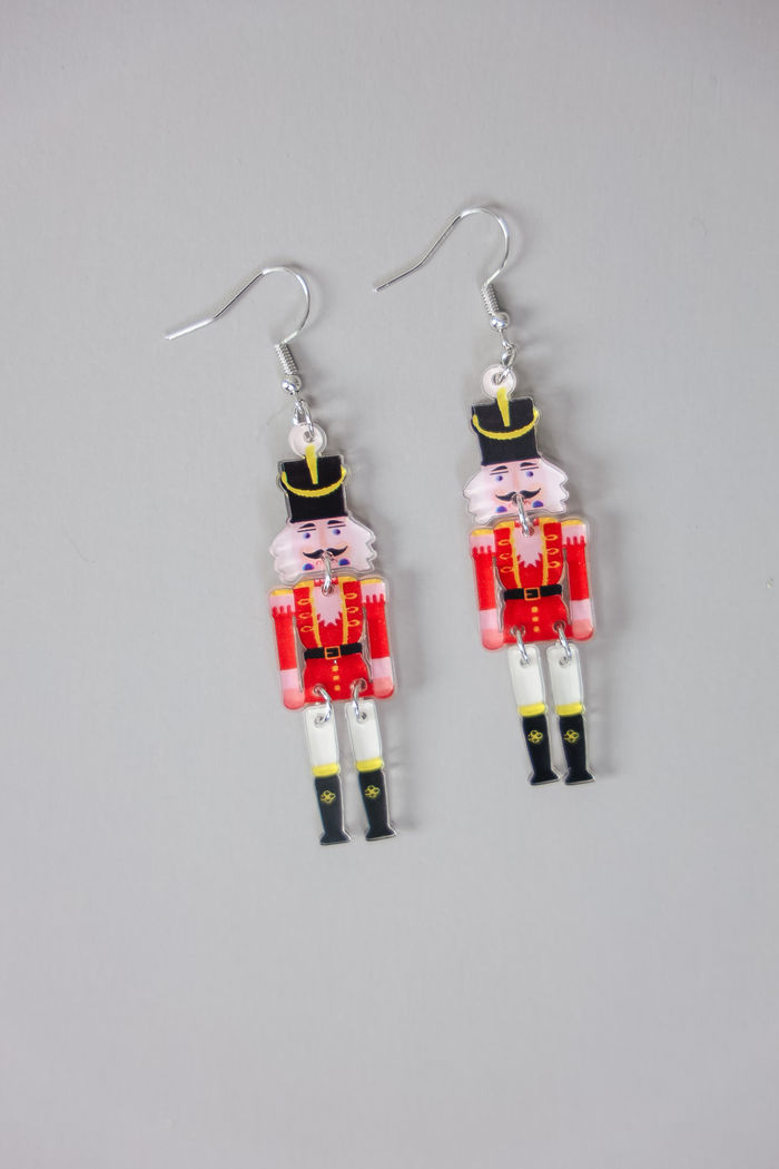 BRINCO QUEBRA-NOZES VERMELHO