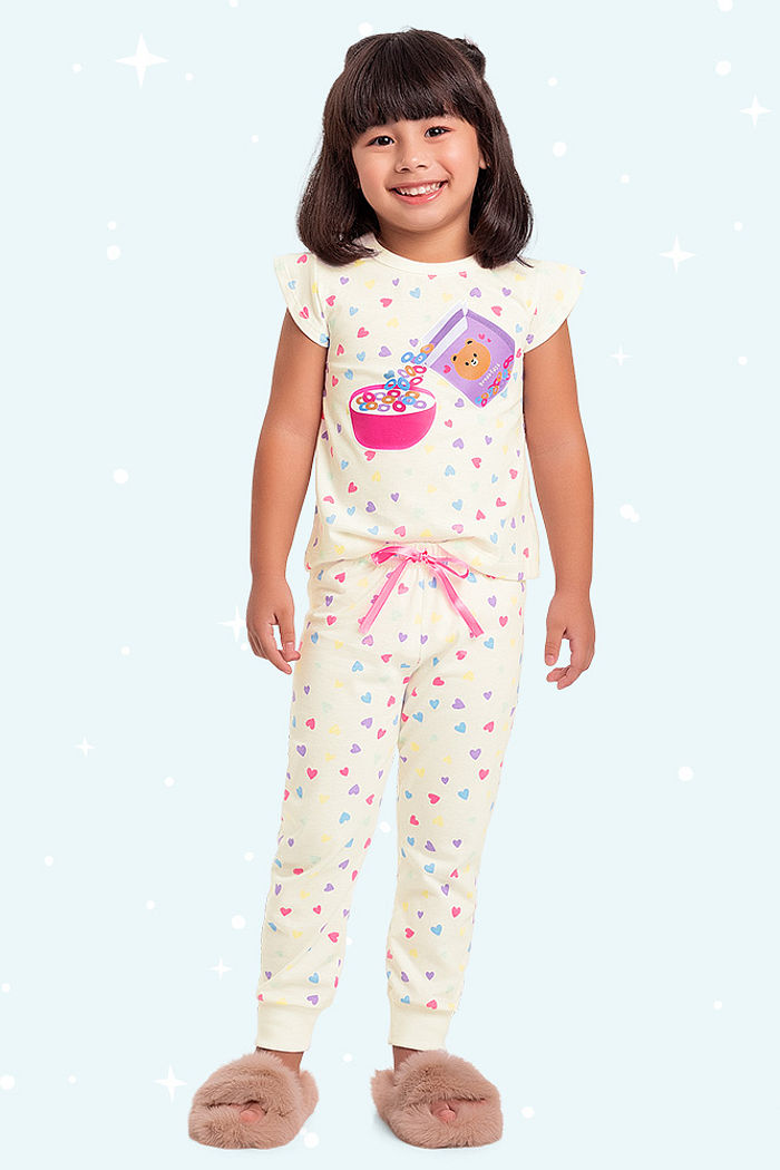 Conjunto pijama blusa e calça com tinta que brilha no escuro