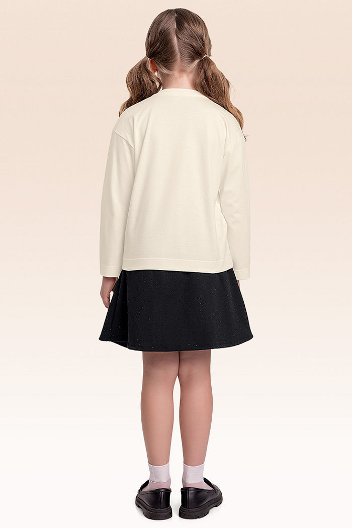 Conjunto blusa manga longa e shorts saia