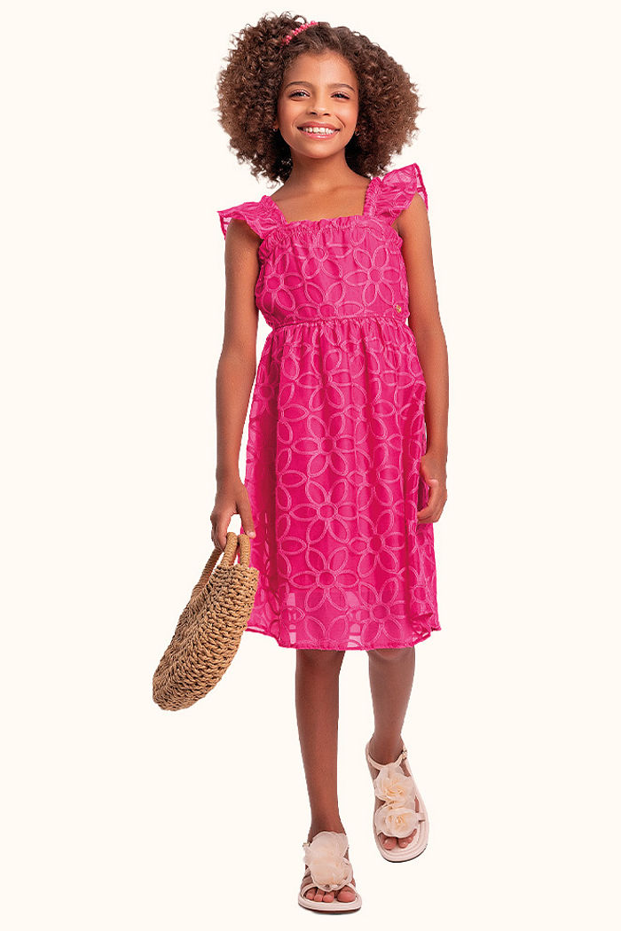 Vestido em tule bordado e forro em meia malha