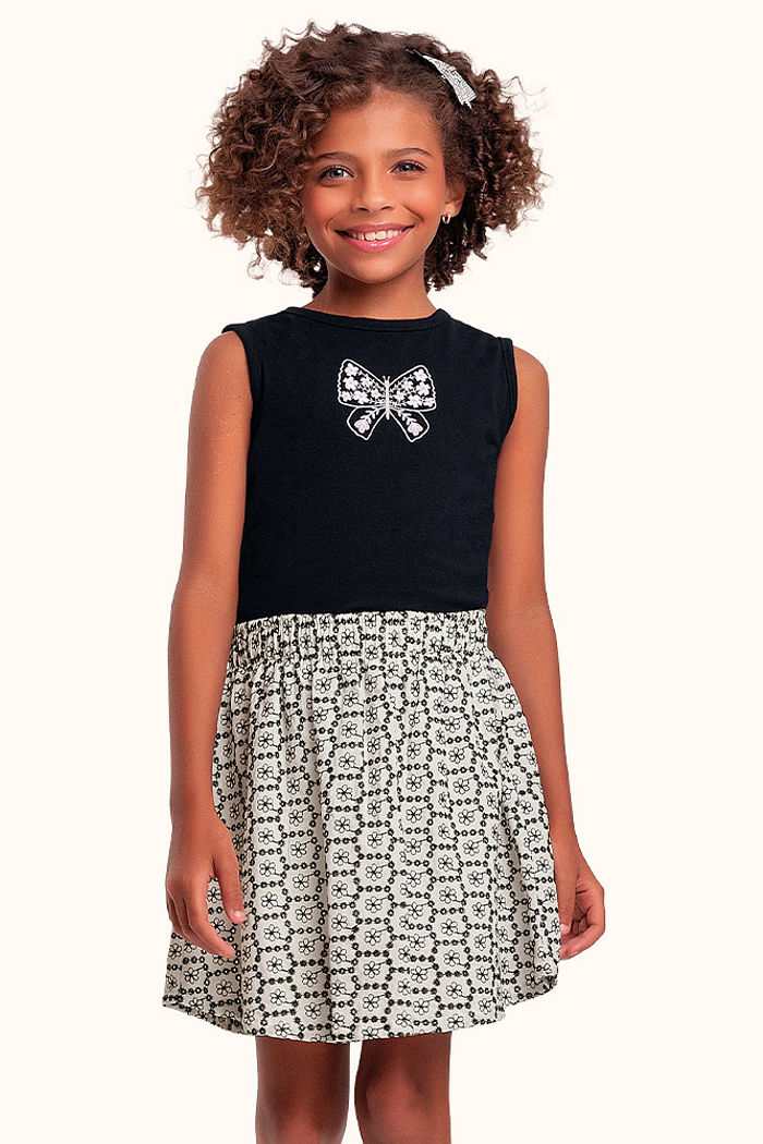 Conjunto regata em cotton leve e short saia em tecido com bordado