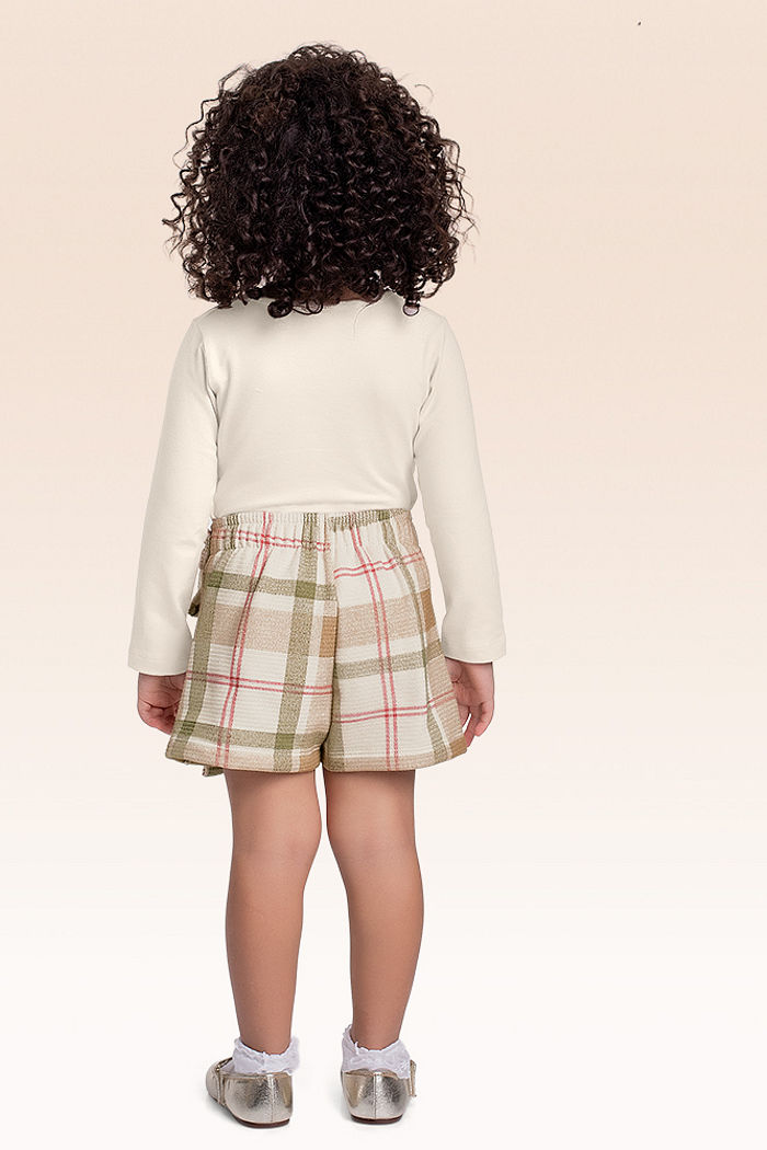 Conjunto blusa manga longa e shorts saia