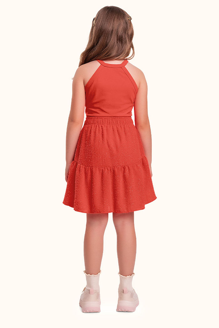 Conjunto regata em cotton leve e short saia em tecido brilho