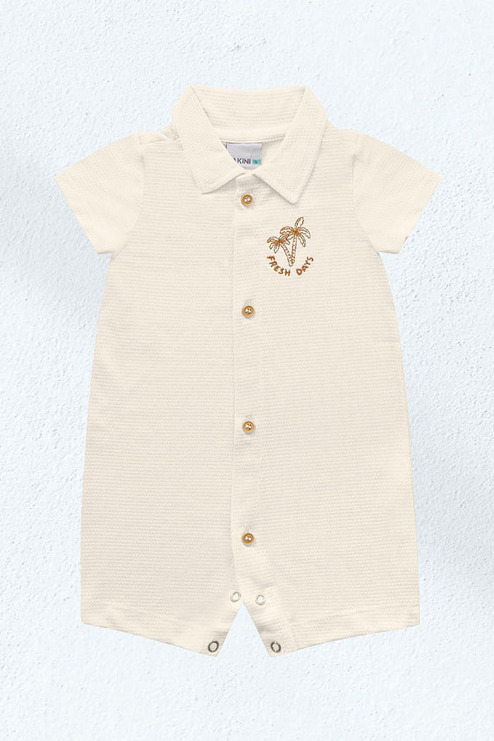 Macacão com botão de pressão em malha favo