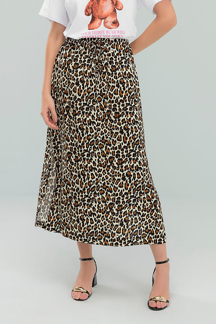 Saia midi com fenda lateral, elático na cintura e laço decorativo