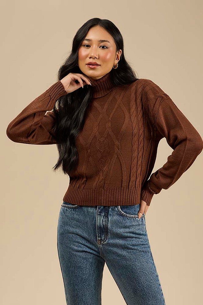 Casaco em tricot gola alta