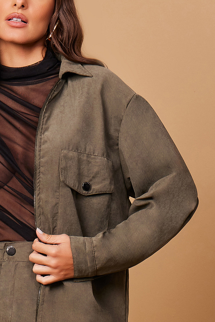 JAQUETA ESPORTIVA EM CUPRO BOLSOS FRONTAIS