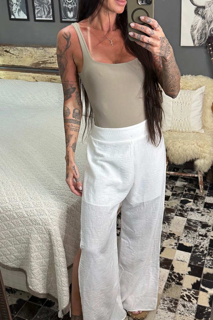 Calça pantalona com abertura lateral Biarritz