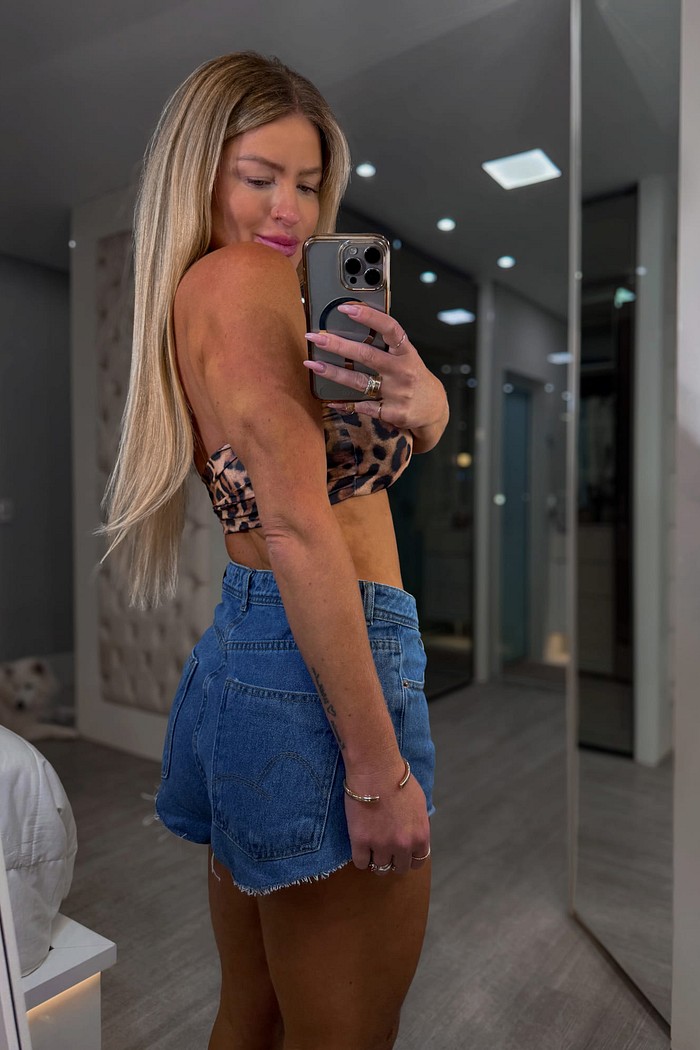 Top tomara que caia com amarração estampa onça