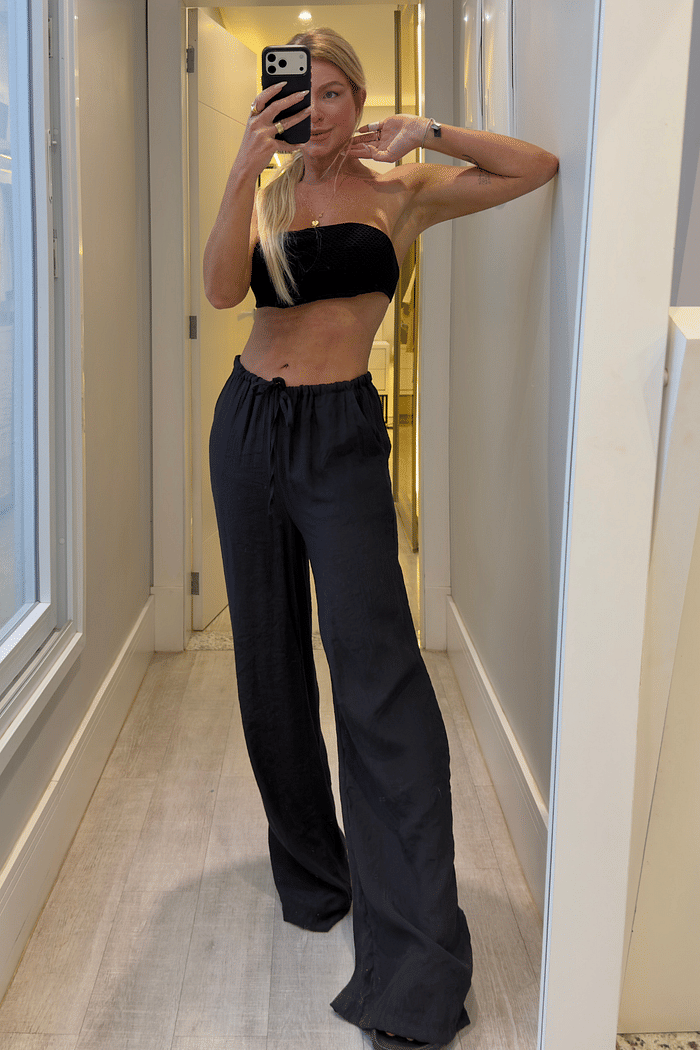 Calça pantalona com amarração em crepe Flora