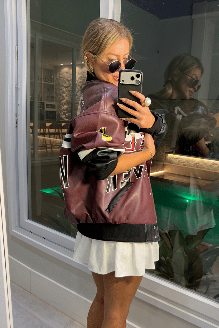 Jaqueta oversized em couro sintético angels