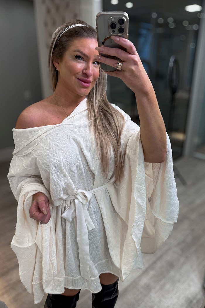 Bata de tricô com amarração