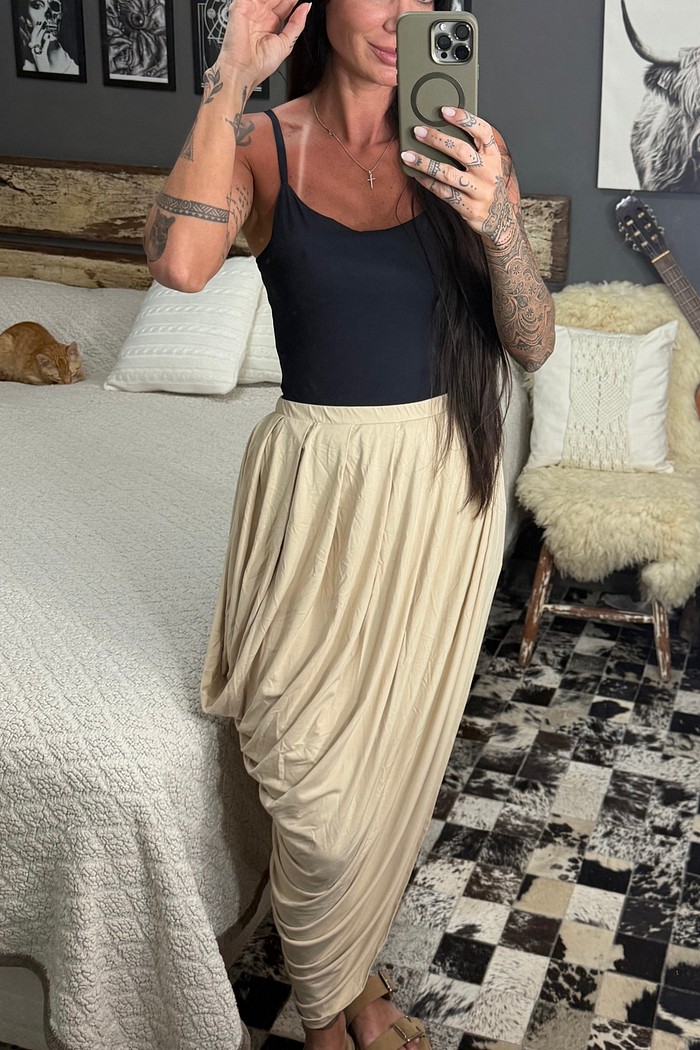 Saia com pregas assimétrica