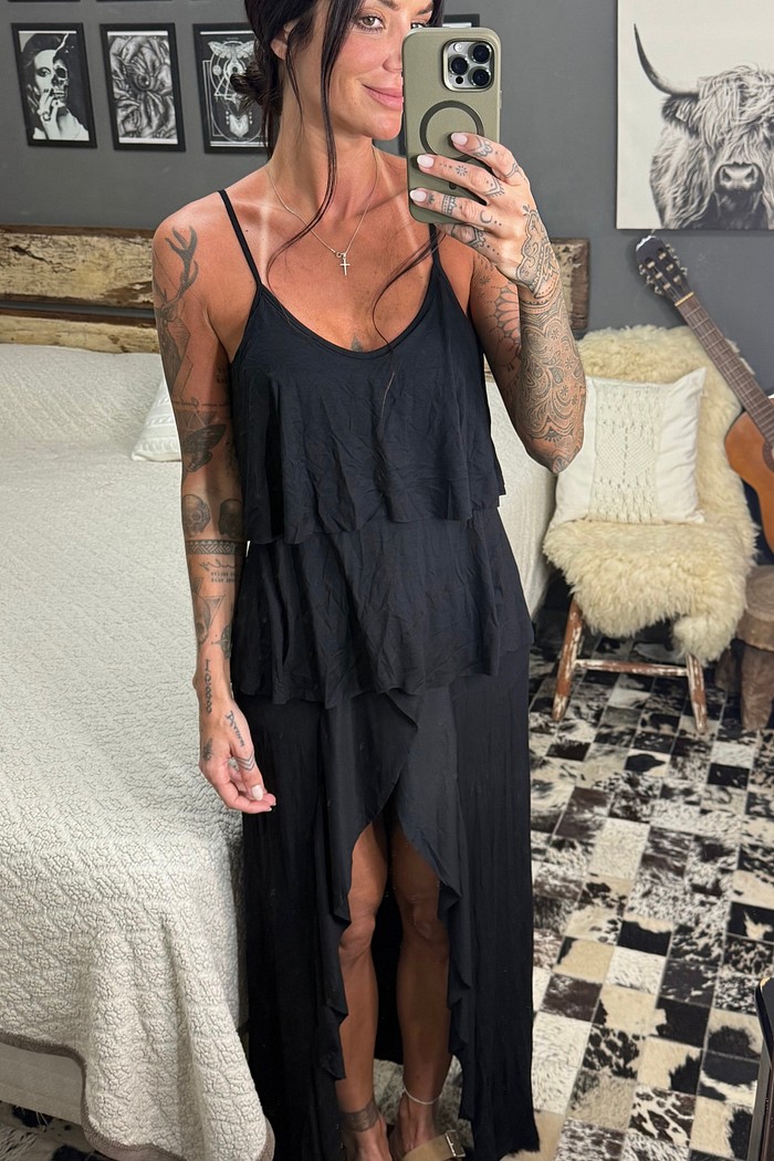 Blusa alongada com babados e abertura Gabi