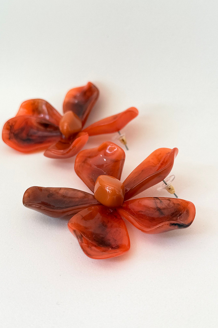 Brinco de acetato laranja