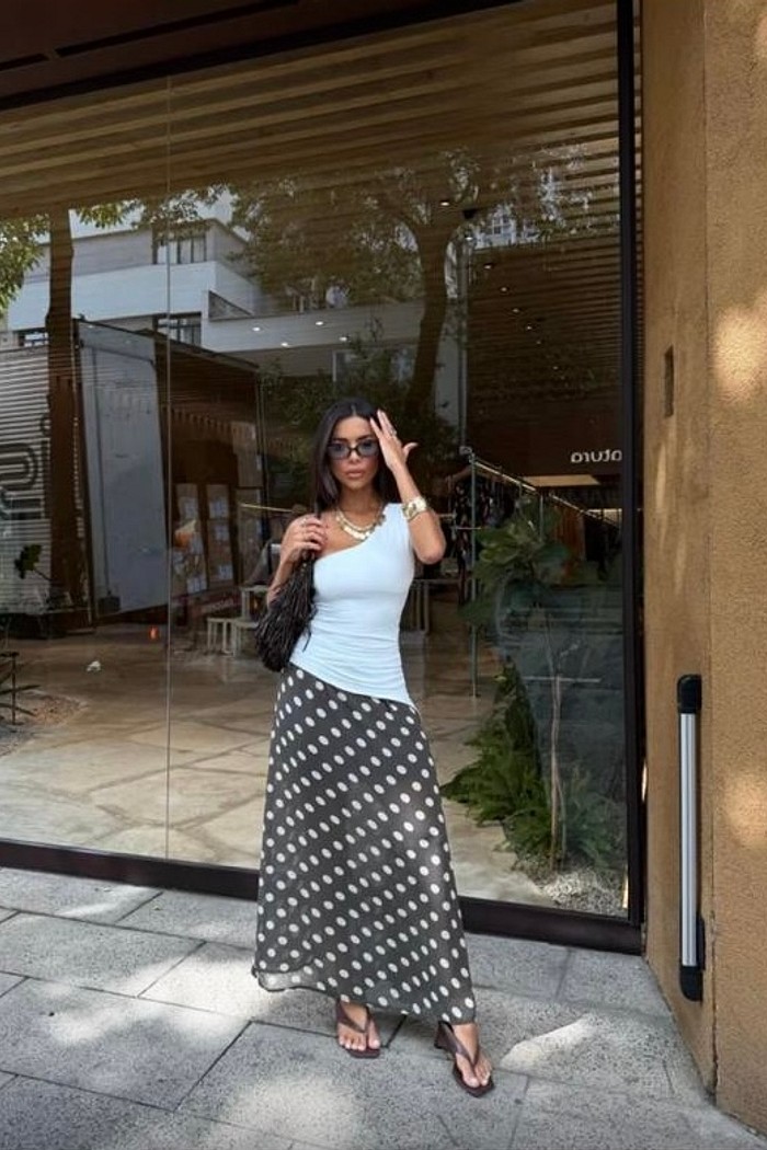 Saia midi estampa poá verde