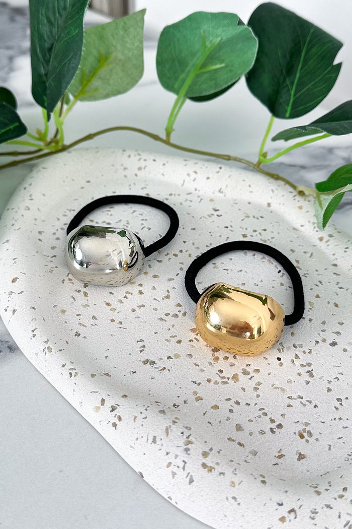 AMARRADOR DOURADO DE CABELO TIANE