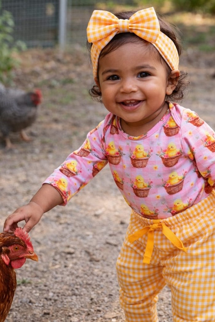 Calça e Laço Xadrez Laranja+ Body estampado