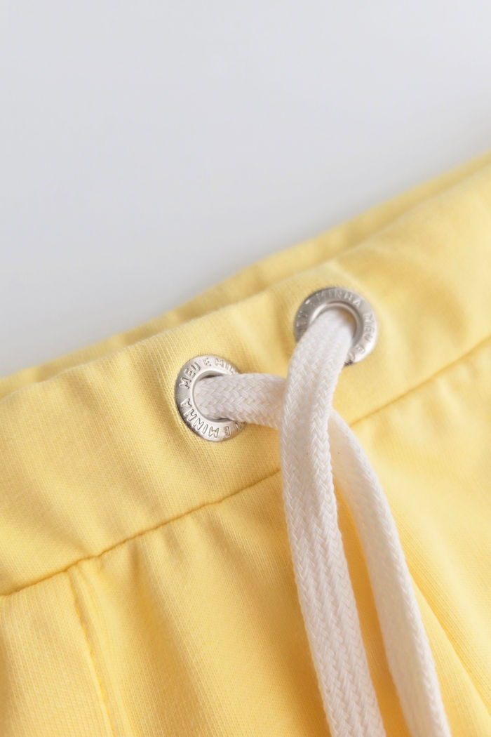 SHORTS UNISSEX AMARELO CLARO