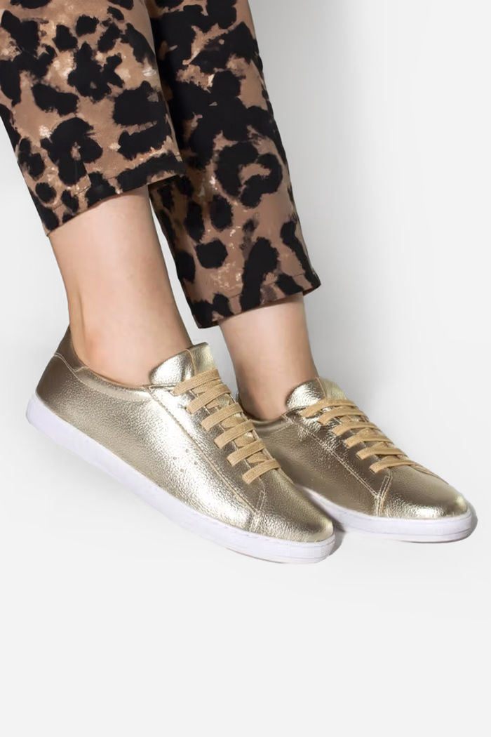 Tênis eXXXtouro em Couro Ouro