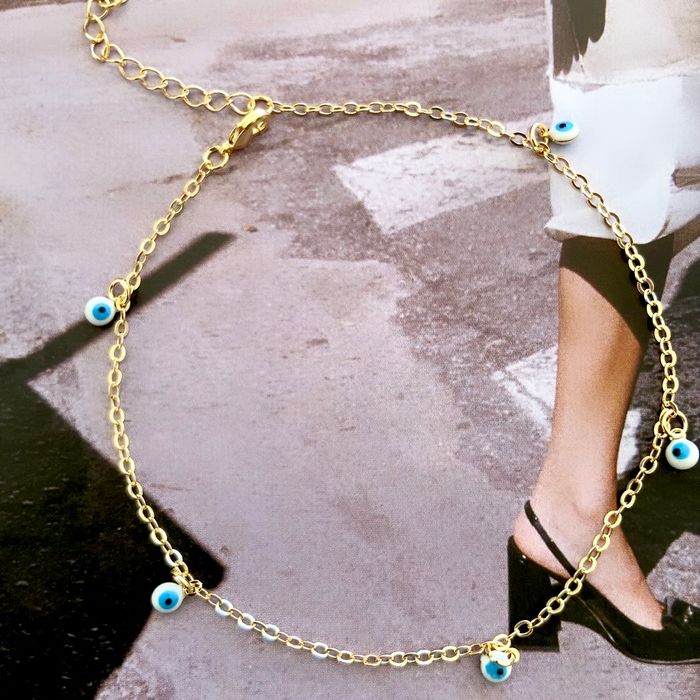 TORNOZELEIRA OLHO GREGO