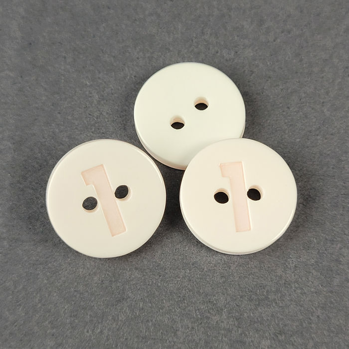 100.770 - BOTÃO COM 12 UN.